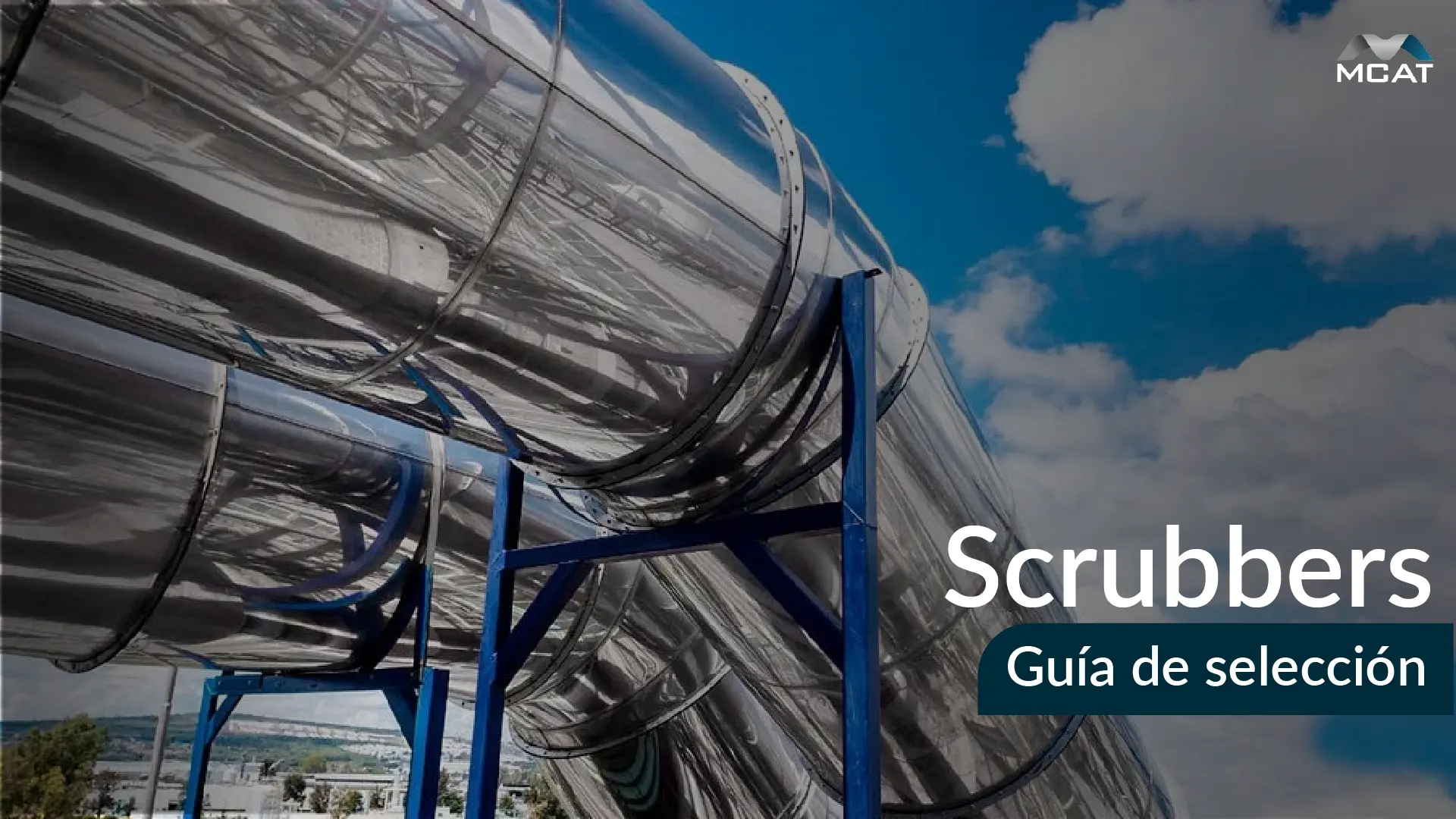 Ingeniero MCAT analizando opciones de scrubbers industriales para control de gases ácidos y partículas.